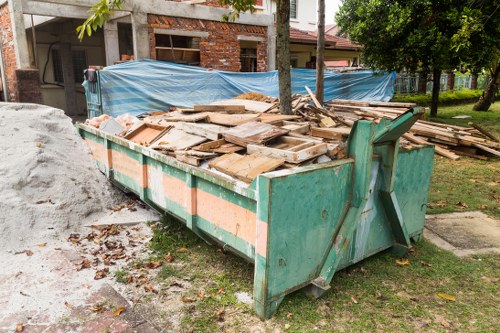 Tomys Waste team clearing furniture from a home