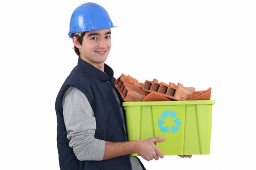 Professional team performing home clearance in Tomys Waste