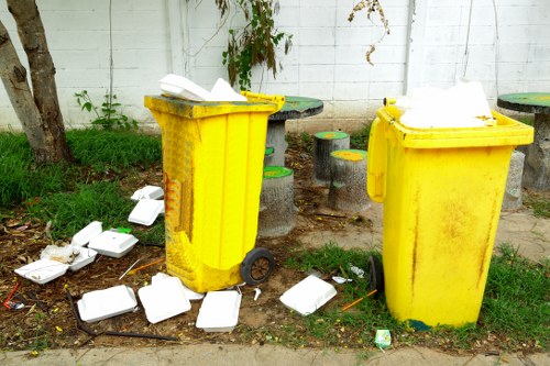 Office clearance professionals from Tomys Waste removing furniture