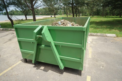 Clearance team sorting and disposing of household items